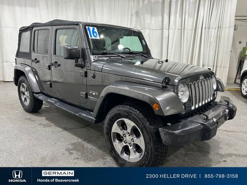 Used 2016 Jeep Wrangler Unlimited Sahara w/ Dual Top Group AWD/4WD image 1