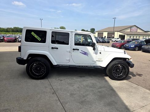Used 2013 Jeep Wrangler Unlimited Sahara w/ Dual Top Group image 4