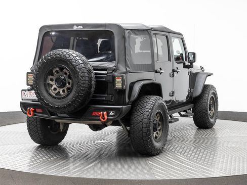 Used 2012 Jeep Wrangler Unlimited Rubicon w/ Dual Top Group AWD/4WD image 5