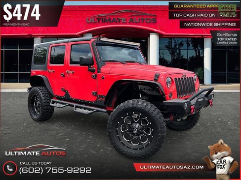 Used 2013 Jeep Wrangler Unlimited Sahara AWD/4WD image 1