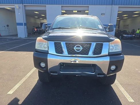 Used 2013 Nissan Titan SV w/ SV Premium Utility Pkg AWD/4WD image 2