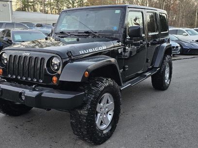 Used 2012 Jeep Wrangler Unlimited Rubicon w/ Dual Top Group