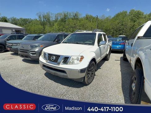 Used 2009 Nissan Frontier LE w/ LE Value Truck Pkg AWD/4WD image 1
