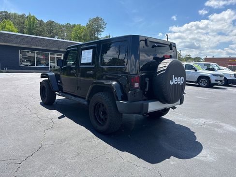 Used 2013 Jeep Wrangler Unlimited Sahara w/ Mopar Chrome Edition Group AWD/4WD image 3