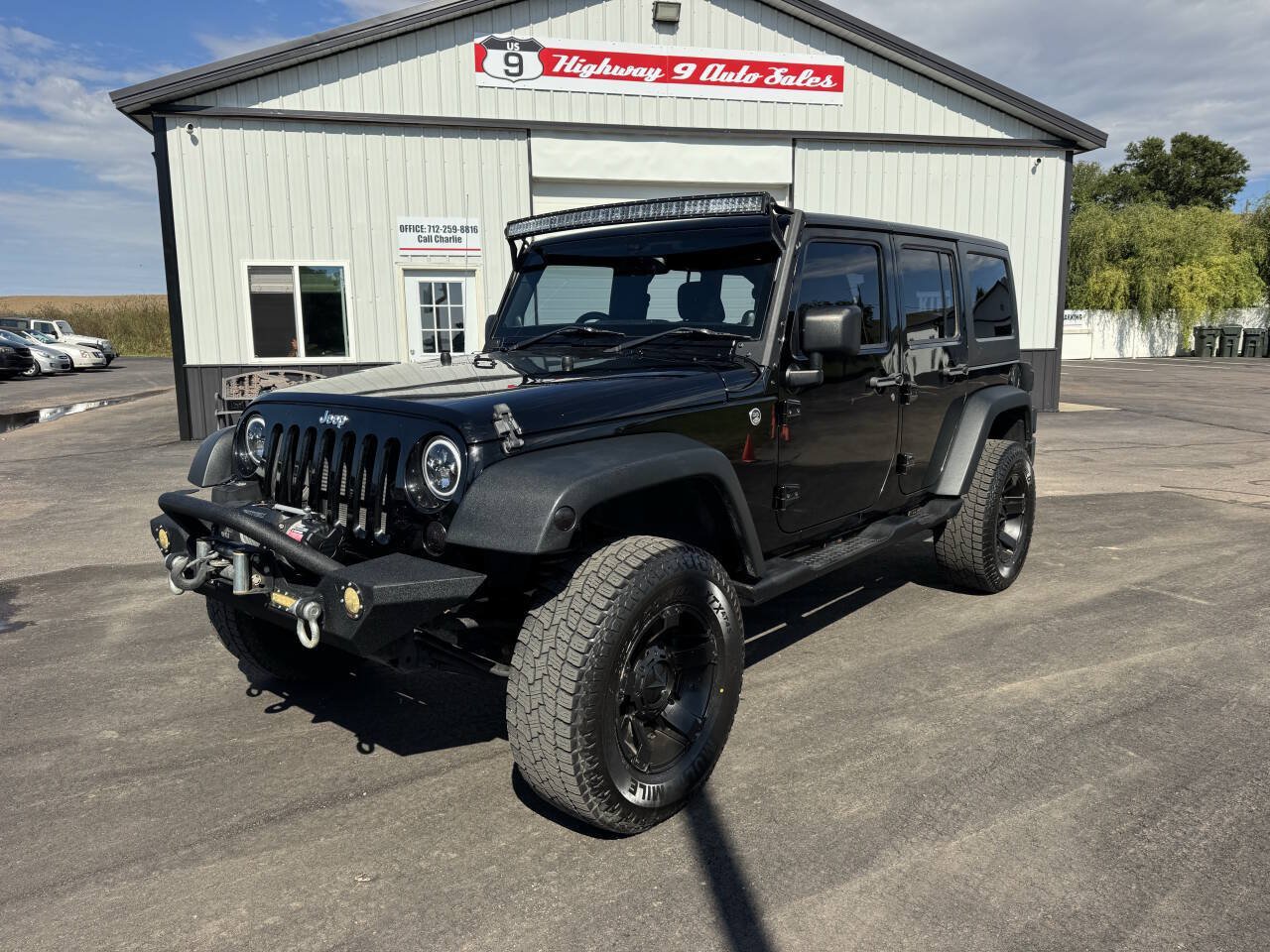 Used 2013 Jeep Wrangler Unlimited Sport AWD/4WD image 1