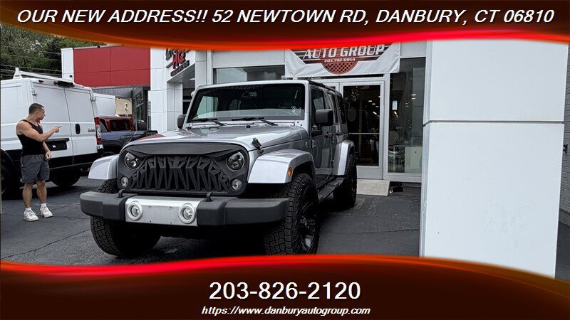 Used 2014 Jeep Wrangler Unlimited Sahara w/ Dual Top Group AWD/4WD image 1