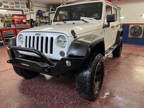Used 2012 Jeep Wrangler Unlimited Sport AWD/4WD image 1