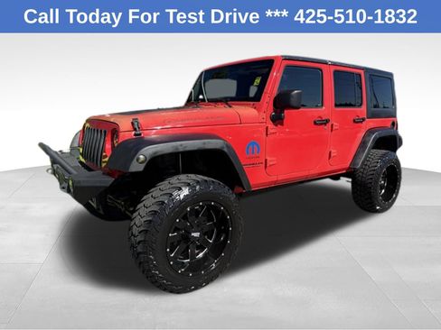 Used 2013 Jeep Wrangler Unlimited Sport AWD/4WD image 1