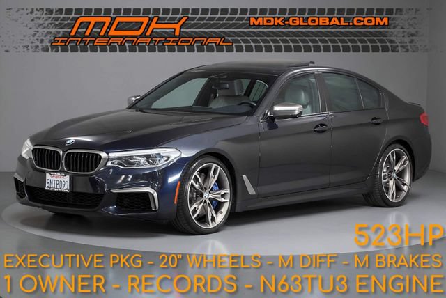 Used 2020 BMW M550i xDrive w/ Executive Package AWD/4WD image 1