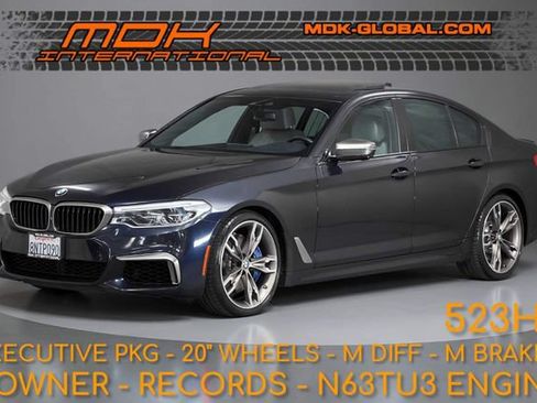Used 2020 BMW M550i xDrive w/ Executive Package AWD/4WD image 1
