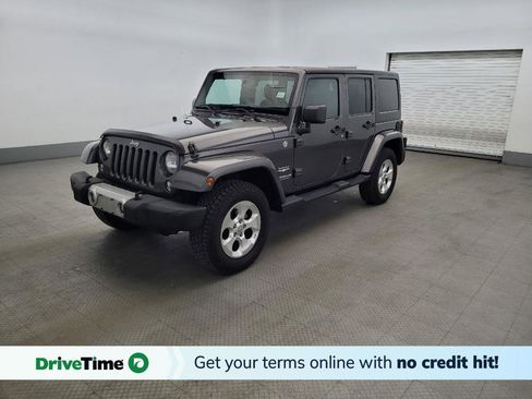 Used 2014 Jeep Wrangler Unlimited Sahara w/ Dual Top Group AWD/4WD image 1