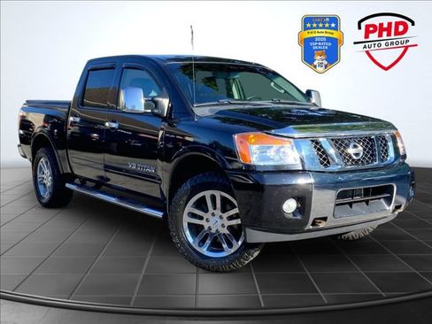 Used 2013 Nissan Titan SL AWD/4WD image 1