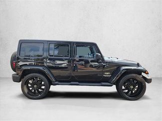 Used 2014 Jeep Wrangler Unlimited Sahara w/ Connectivity Group AWD/4WD video 4