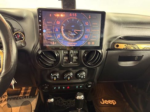 Used 2014 Jeep Wrangler Unlimited Sahara AWD/4WD image 18