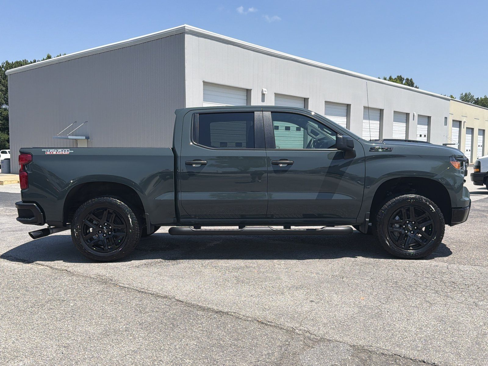 Used 2025 Chevrolet Silverado 1500 Custom Trail Boss w/ Turbomax Blackout Package AWD/4WD image 13
