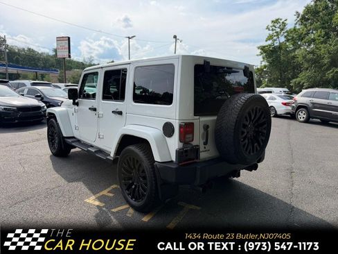 Used 2013 Jeep Wrangler Unlimited Sahara w/ Dual Top Group AWD/4WD image 6