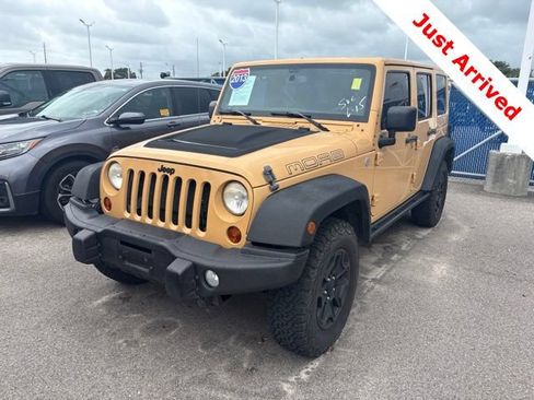 Used 2013 Jeep Wrangler Unlimited Sahara AWD/4WD image 1