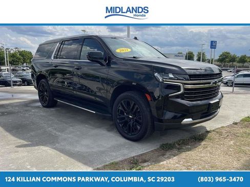 Used 2021 Chevrolet Suburban LT w/ Rear Media and Nav Package AWD/4WD image 1