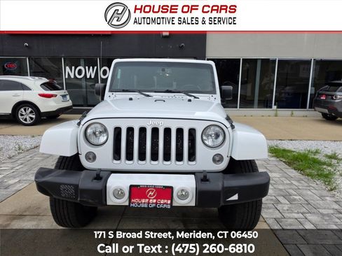 Used 2016 Jeep Wrangler Unlimited Sahara w/ Dual Top Group AWD/4WD image 1