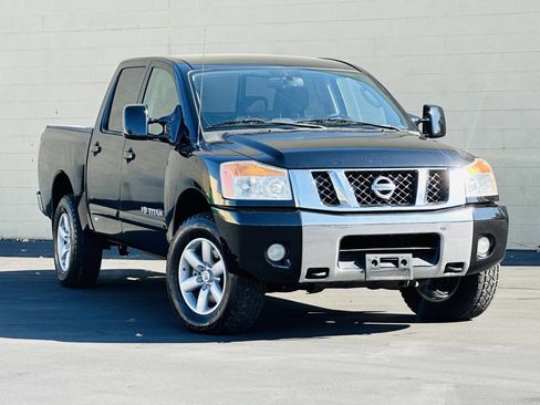 Used 2010 Nissan Titan SE w/ SE Value Truck Pkg AWD/4WD image 1