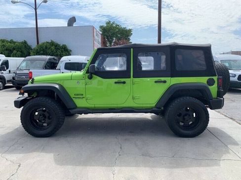 Used 2013 Jeep Wrangler Unlimited Sport w/ Mopar Black Appearance Group AWD/4WD image 4