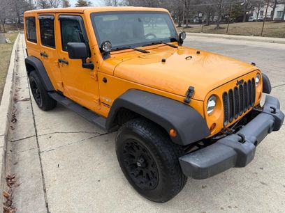 Used 2012 Jeep Wrangler Unlimited Sahara w/ Dual Top Group