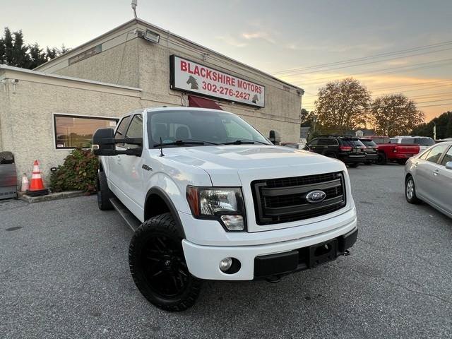 Used 2013 Ford F150 FX4 w/ Mid Equipment Group AWD/4WD image 1