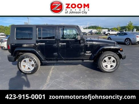Used 2010 Jeep Wrangler Unlimited Sahara w/ Trailer Tow Group AWD/4WD image 1