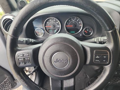 Used 2013 Jeep Wrangler Unlimited Sahara w/ Dual Top Group AWD/4WD image 13