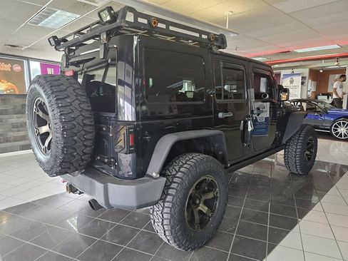 Used 2013 Jeep Wrangler Unlimited Sahara w/ Connectivity Group AWD/4WD image 4