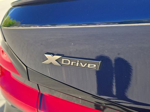 Used 2021 BMW M550i xDrive w/ Dynamic Handling Package AWD/4WD image 32
