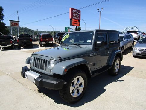 Used 2014 Jeep Wrangler Sahara w/ Dual Top Group AWD/4WD image 1