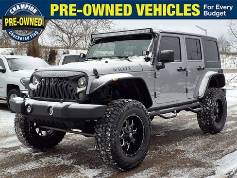 Used 2014 Jeep Wrangler Unlimited Sport image 1