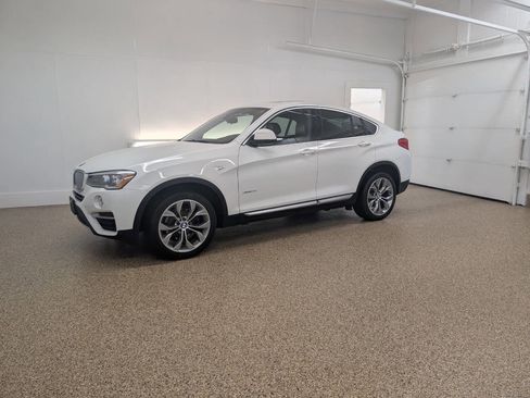 Used 2017 BMW X4 xDrive28i AWD/4WD image 1