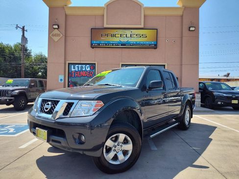 Used 2013 Nissan Frontier SV w/ SV Value Truck Pkg AWD/4WD image 1