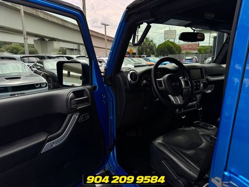 Used 2016 Jeep Wrangler Unlimited Sahara w/ Dual Top Group AWD/4WD image 22