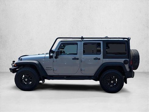 Used 2013 Jeep Wrangler Unlimited Sport AWD/4WD image 9