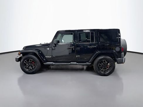 Used 2012 Jeep Wrangler Unlimited Sahara AWD/4WD image 9