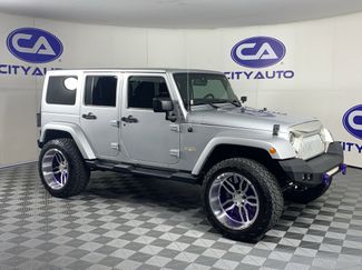 Used 2012 Jeep Wrangler Unlimited Sahara w/ Trailer Tow Group AWD/4WD video 1