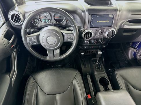 Used 2013 Jeep Wrangler Unlimited Sahara w/ Dual Top Group AWD/4WD image 3