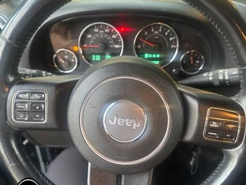 Used 2014 Jeep Wrangler Unlimited Sahara w/ Dual Top Group AWD/4WD image 9