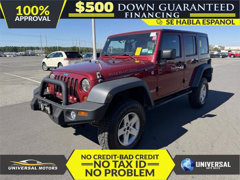 Used 2012 Jeep Wrangler Unlimited Rubicon w/ Dual Top Group AWD/4WD image 1
