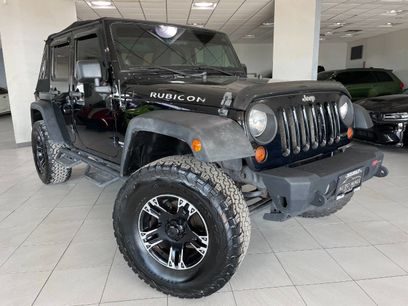 Used 2011 Jeep Wrangler Unlimited Rubicon w/ Dual Top Group