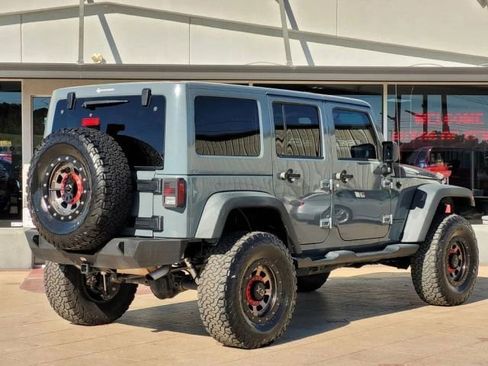 Used 2014 Jeep Wrangler Unlimited Rubicon w/ Dual Top Group AWD/4WD image 4