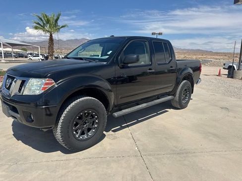 Used 2014 Nissan Frontier SV w/ SV Value Truck Package AWD/4WD image 1