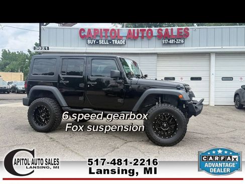 Used 2013 Jeep Wrangler Unlimited Sport AWD/4WD image 1