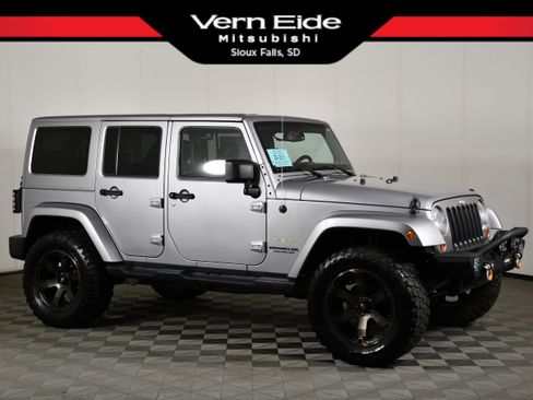 Used 2013 Jeep Wrangler Unlimited Sahara w/ Connectivity Group AWD/4WD image 1