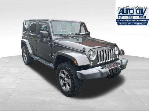 Used 2016 Jeep Wrangler Unlimited Sahara w/ Dual Top Group AWD/4WD image 32