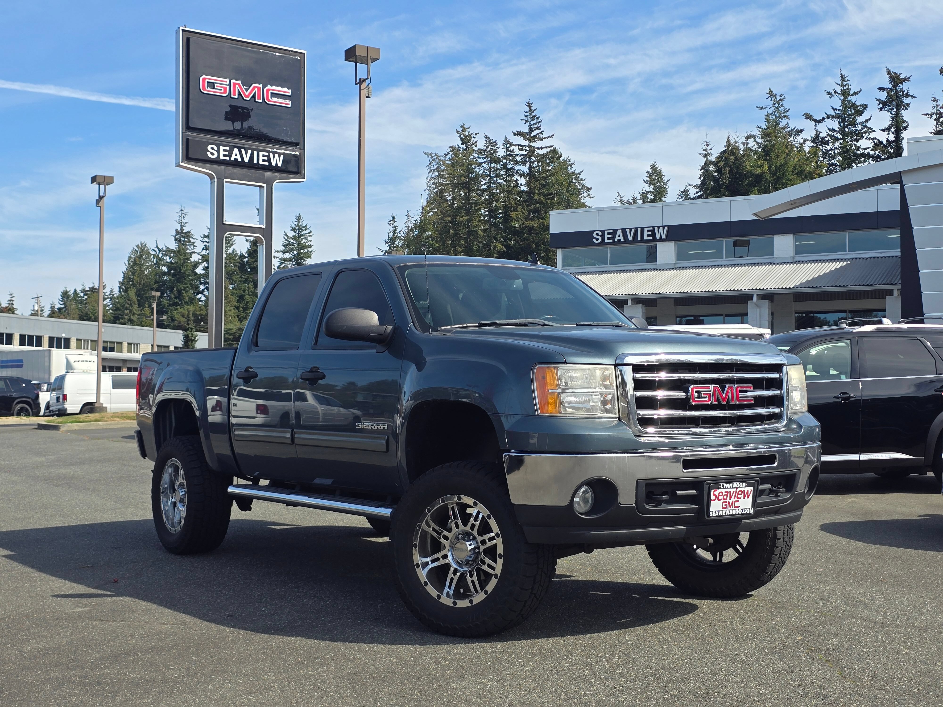 Used 2013 GMC Sierra 1500 SLE w/ Power Tech Package AWD/4WD image 1
