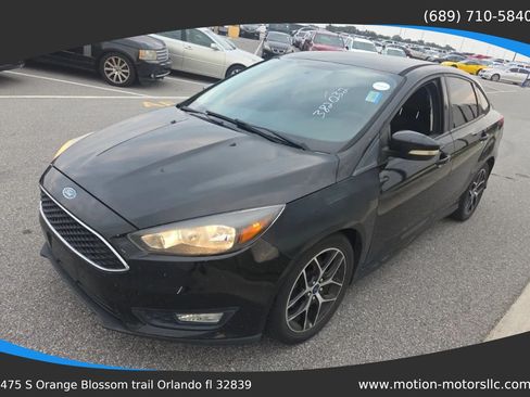 Used 2015 Ford Focus SE w/ SE Sport Package FWD image 1